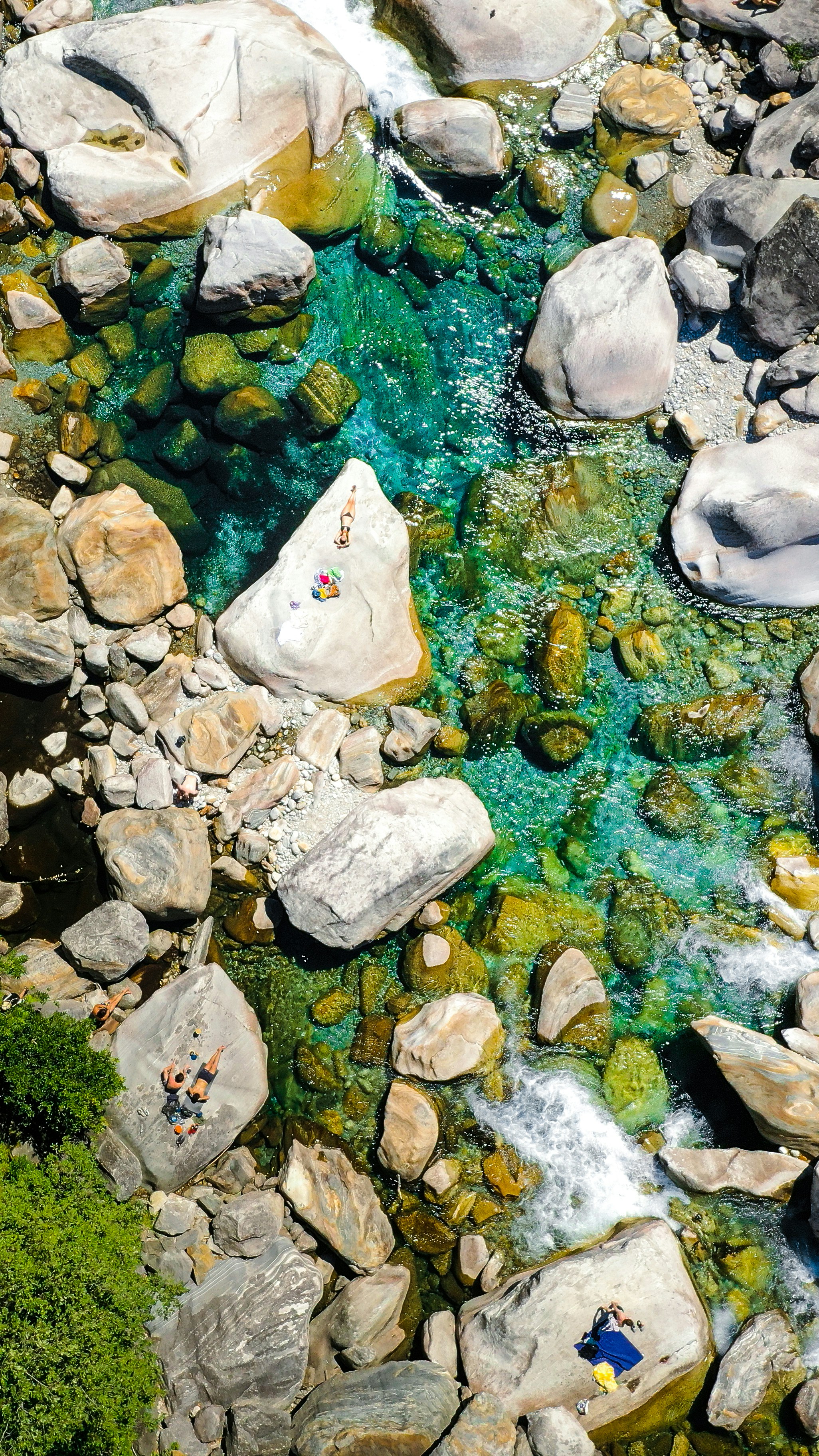 a stream of water with rocks