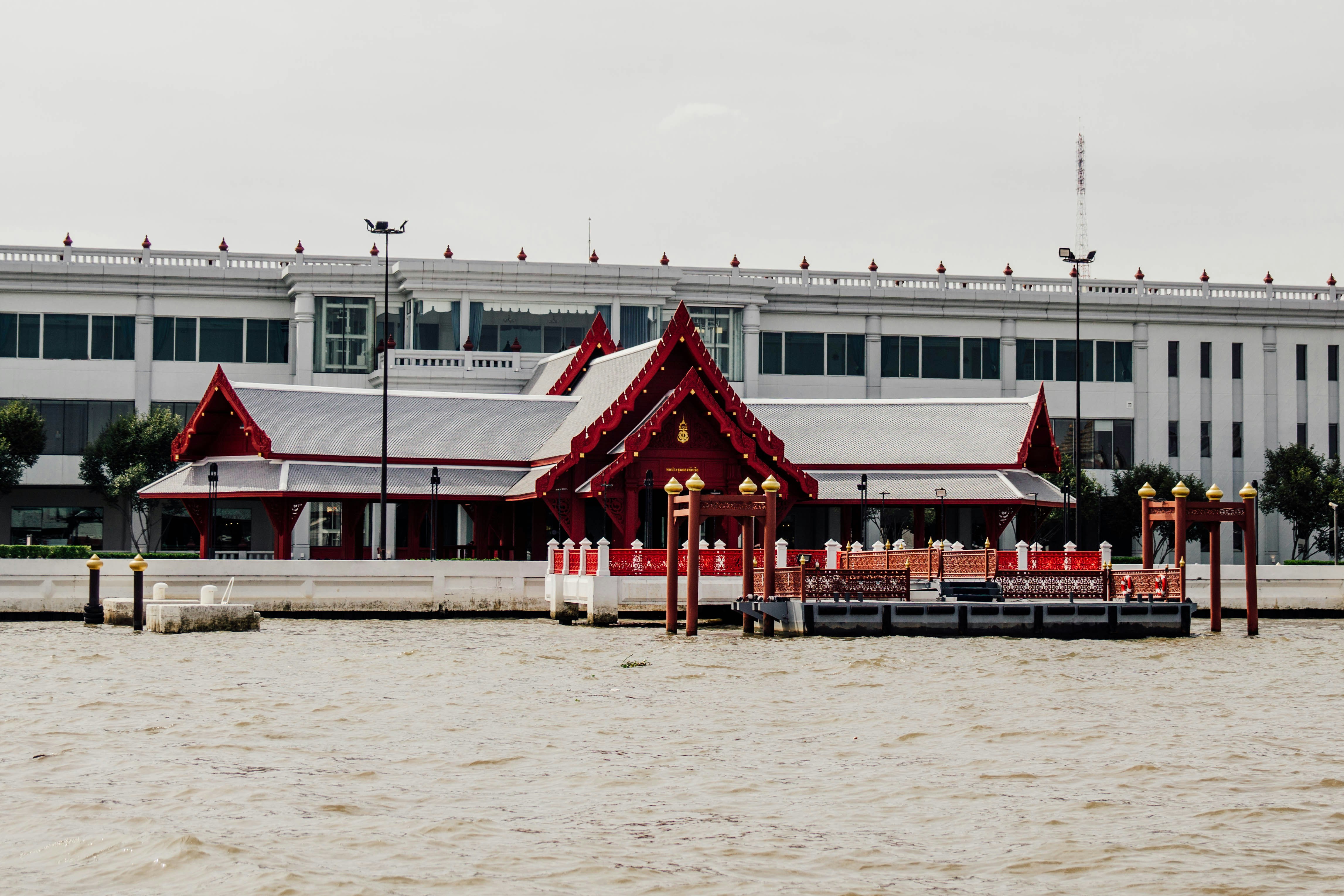 a building with red flags