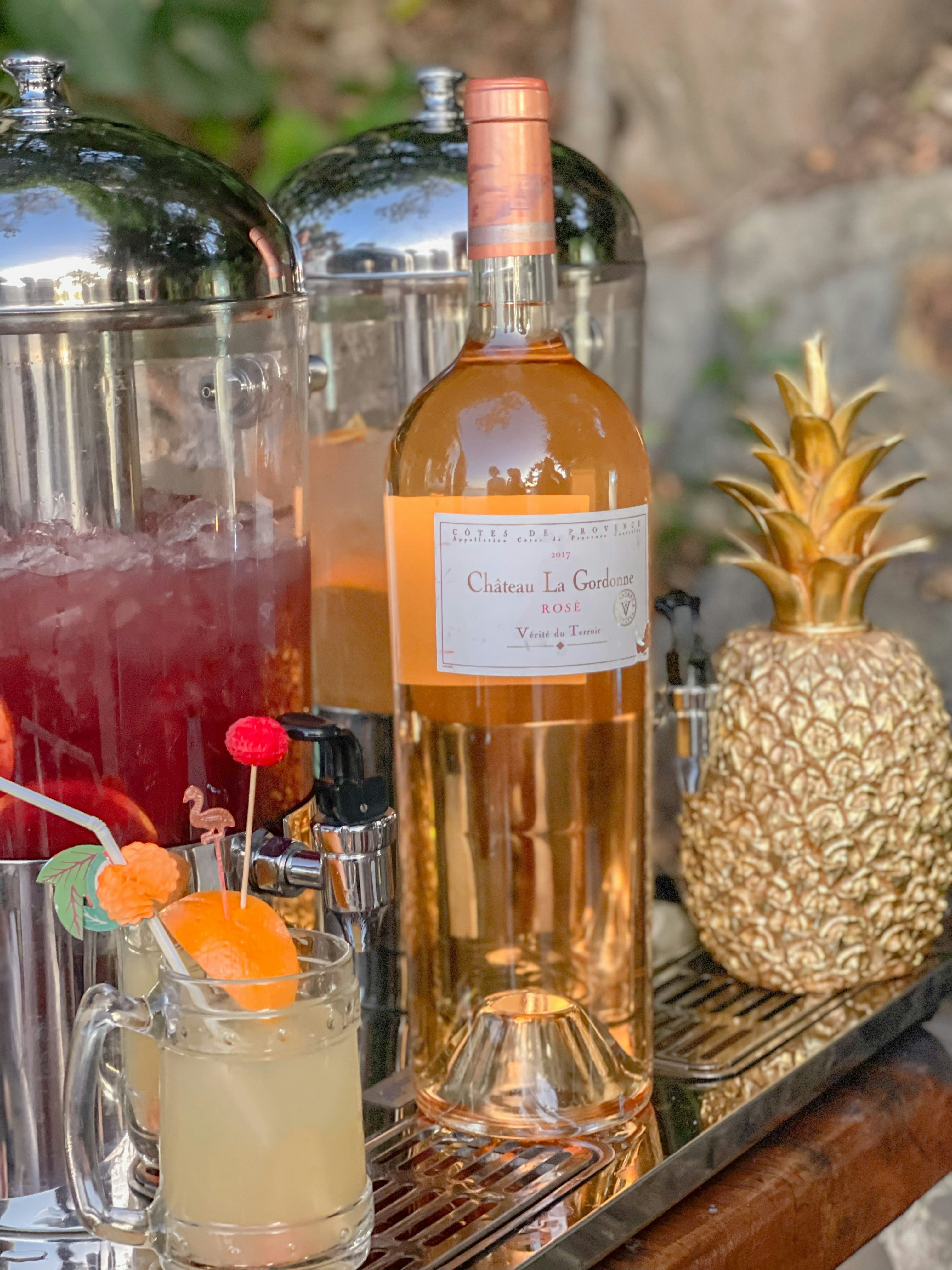 A couple of bottles of alcohol photo Free Noosa Image on Unsplash