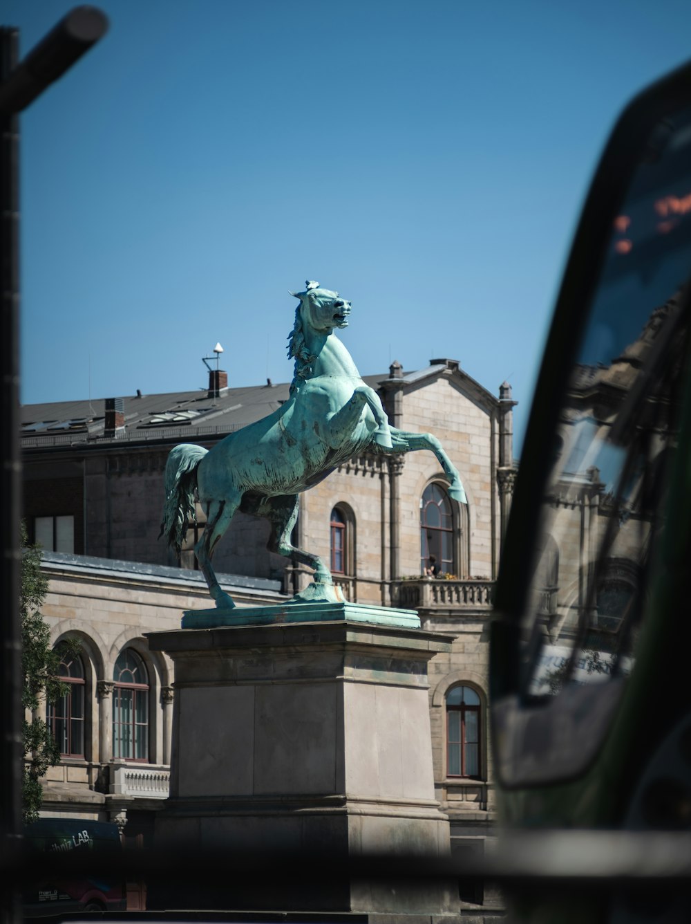 a statue of a person riding a horse