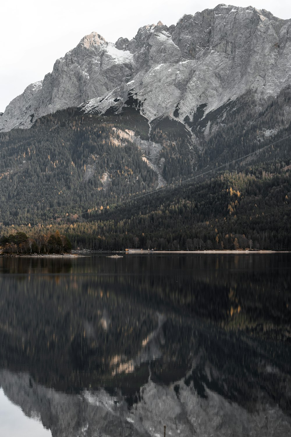 a lake with a mountain in the background