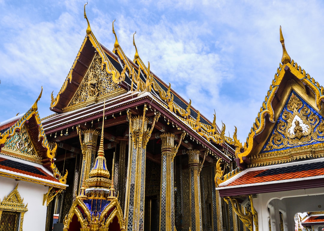 a building with ornate architecture, The Grand Palace of Bangkok.