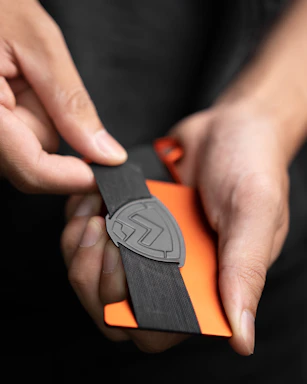 Close-up of a rubber gasket being held in hand, showing texture and flexibility.