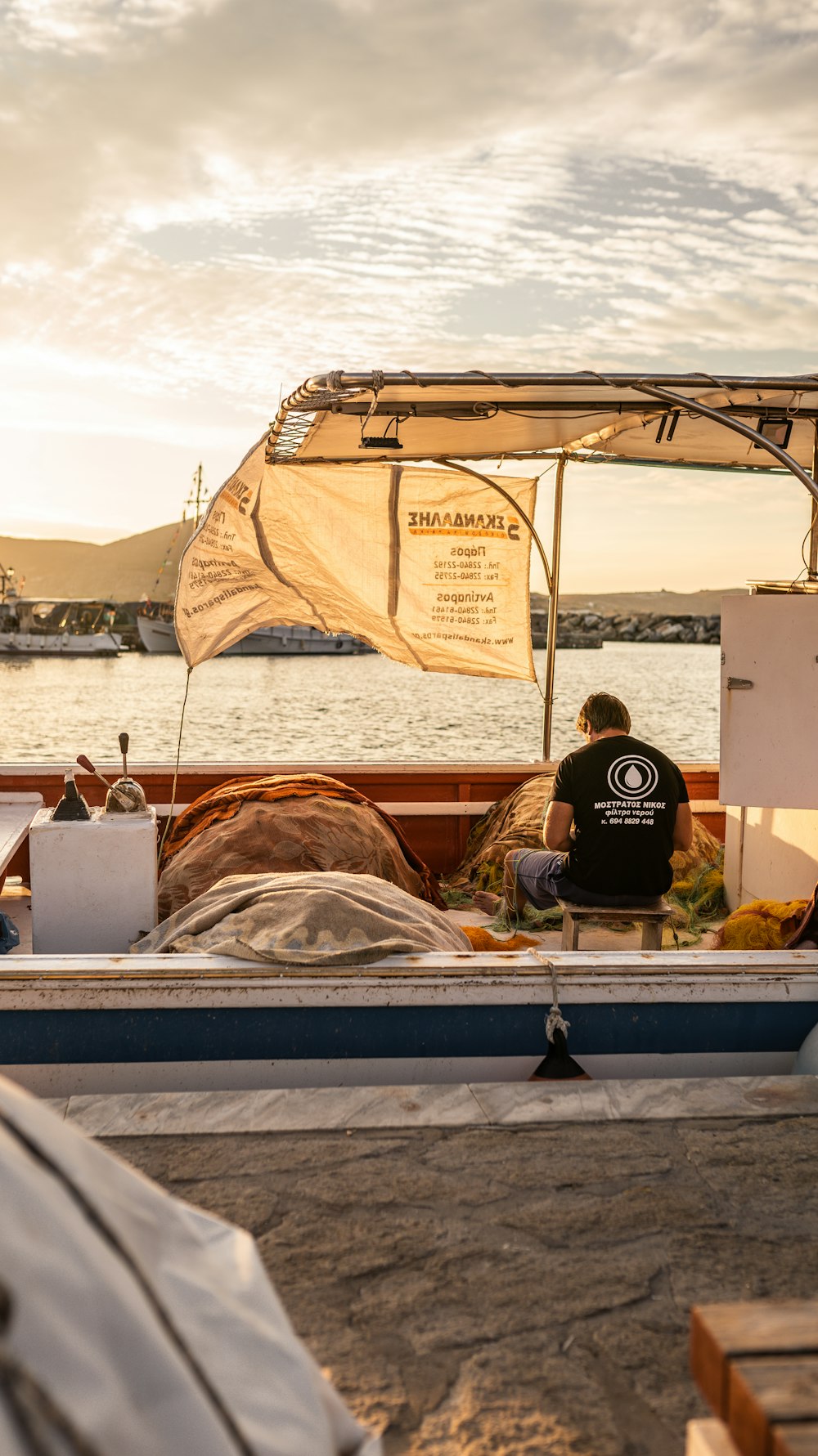 a person sitting on a boat