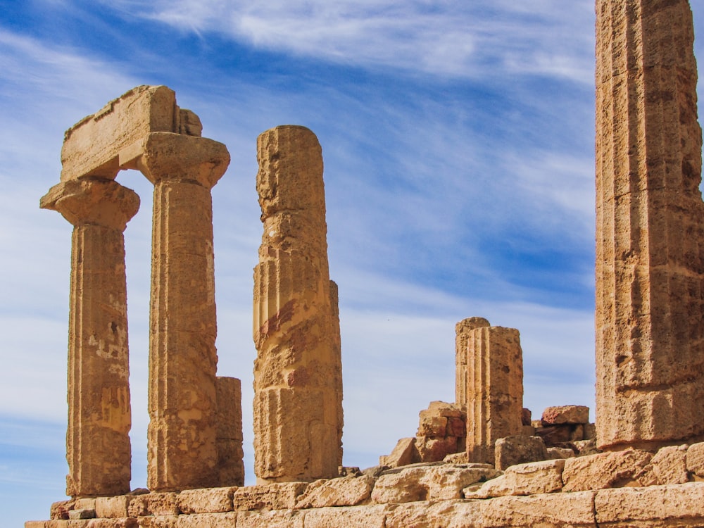 a group of stone pillars