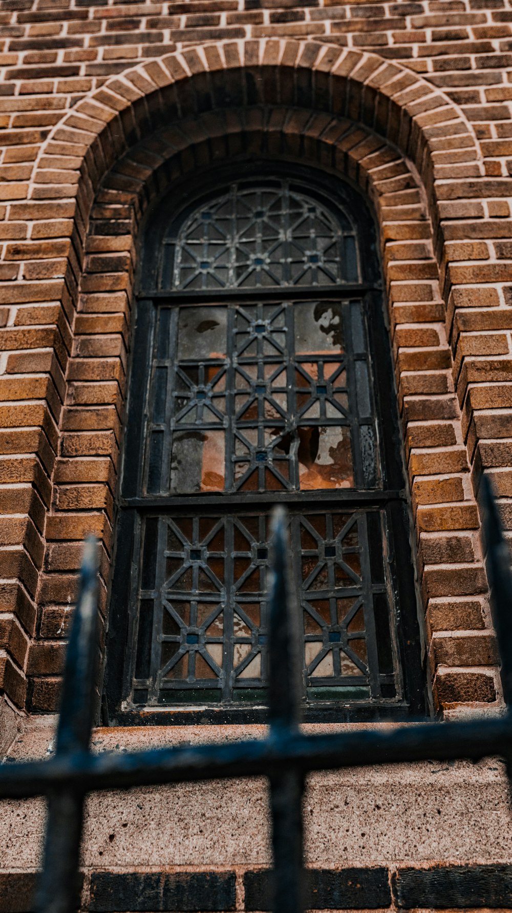 a window in a brick building