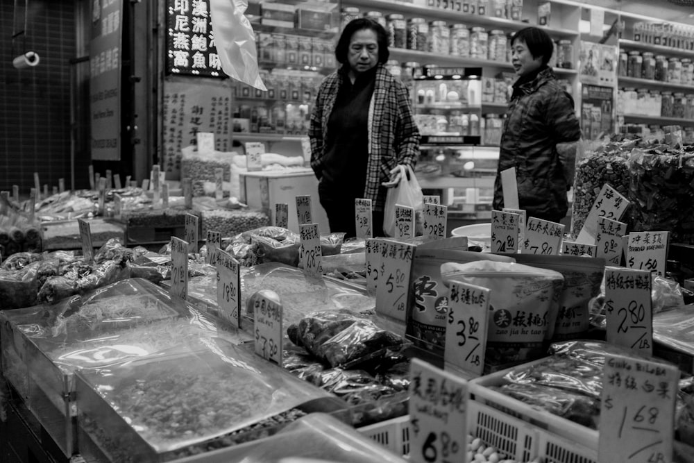 a couple of women in a store