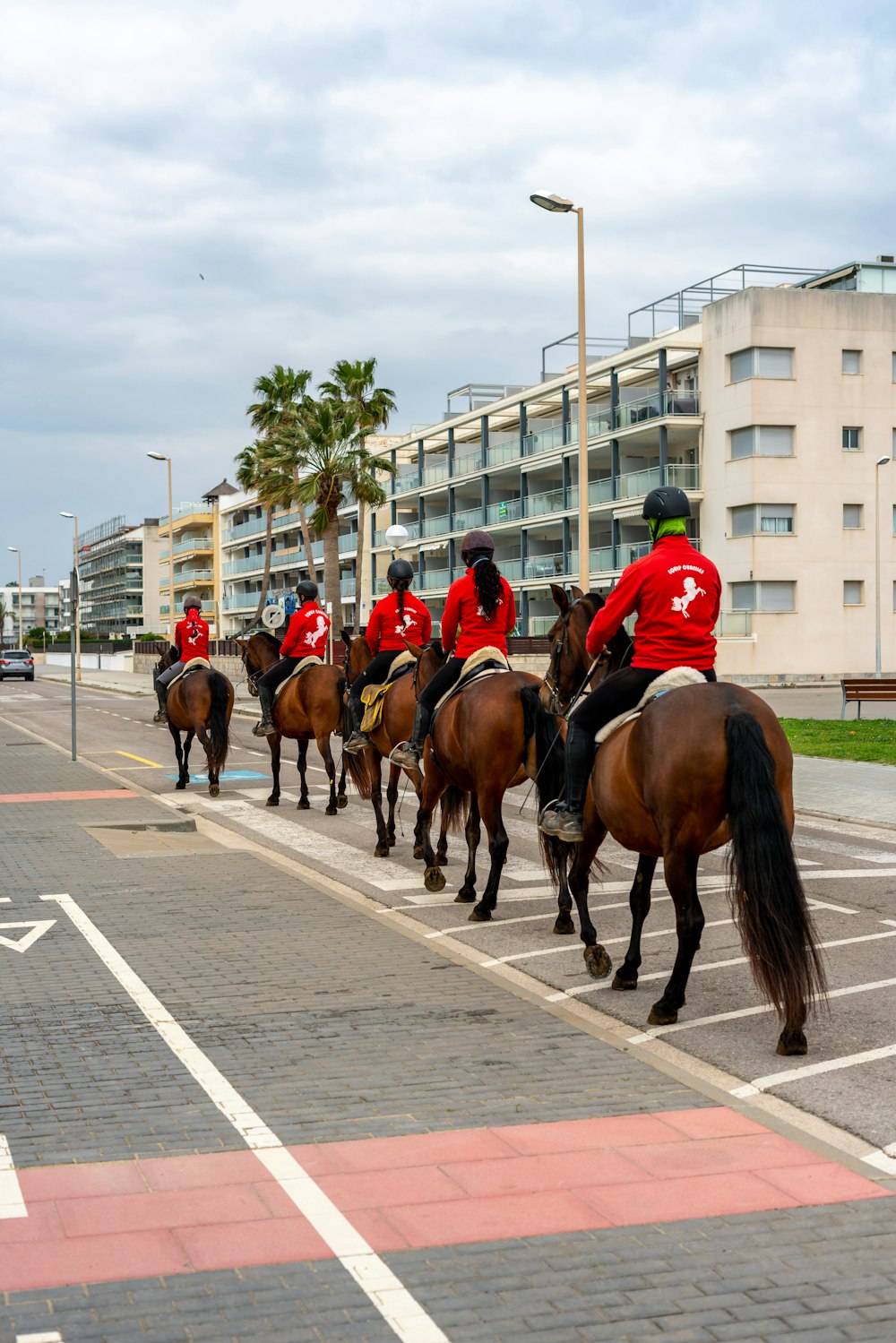 a group of people riding horses