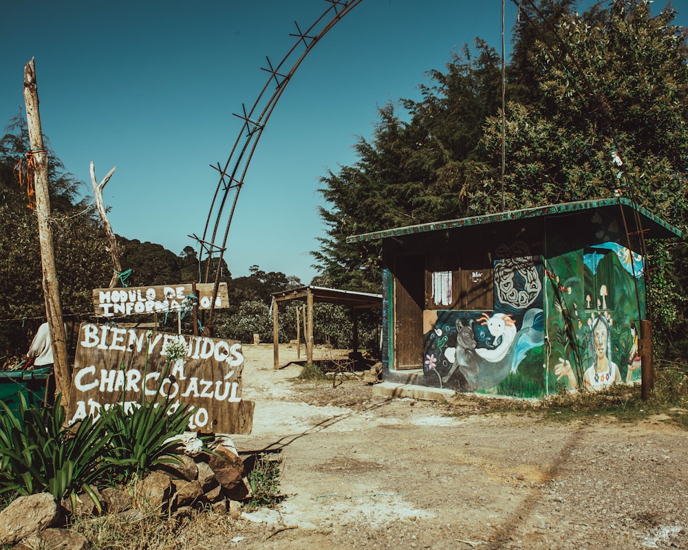 a small shack with graffiti