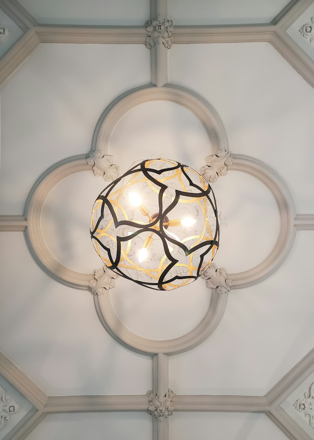 a ceiling with a light fixture