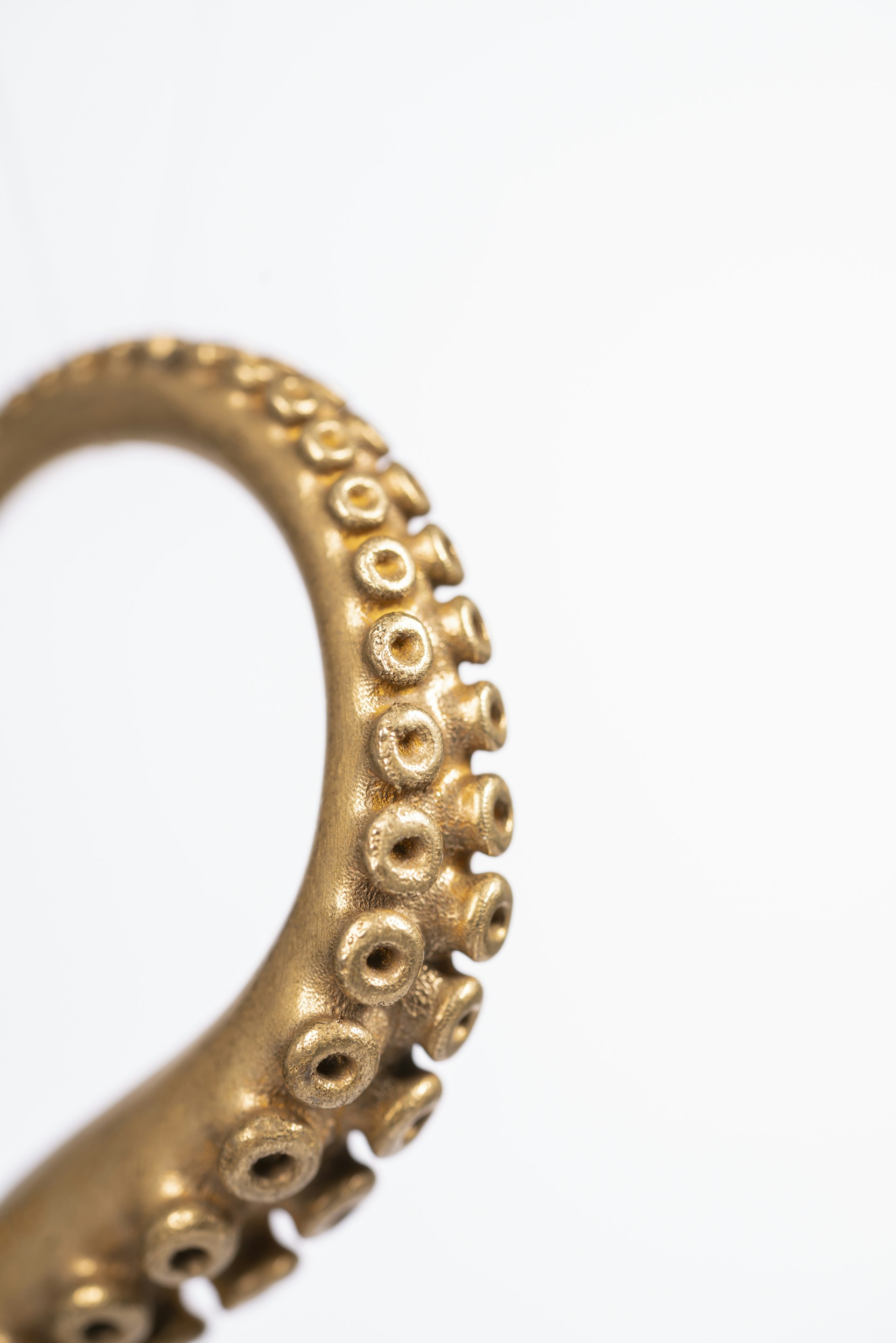 a gold and silver door handle