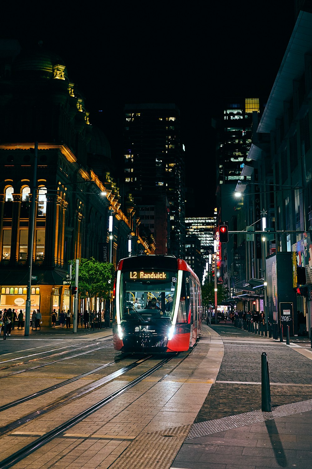 a train on the tracks in a city