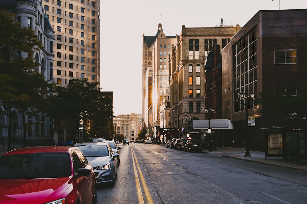 a street with cars and buildings on either side of it