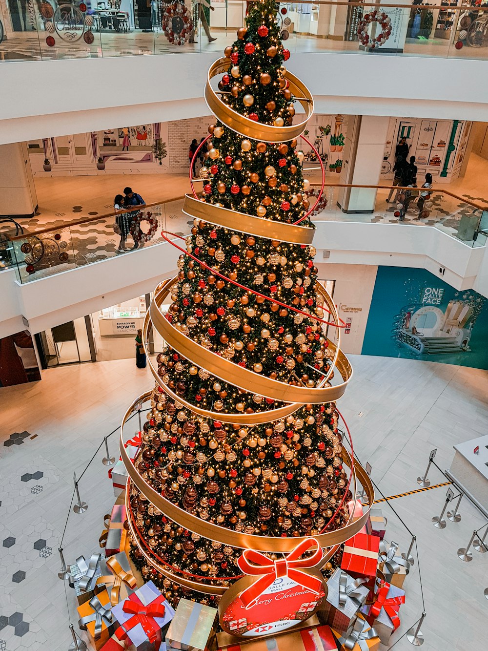 a large decorated tree in a building