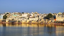 a body of water with buildings along it
