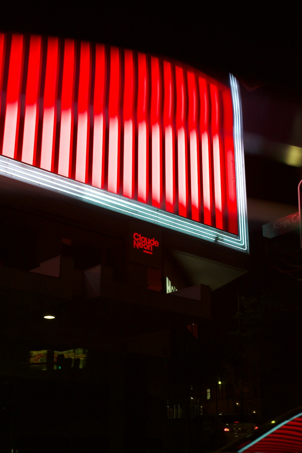 a building with a red and white sign on it