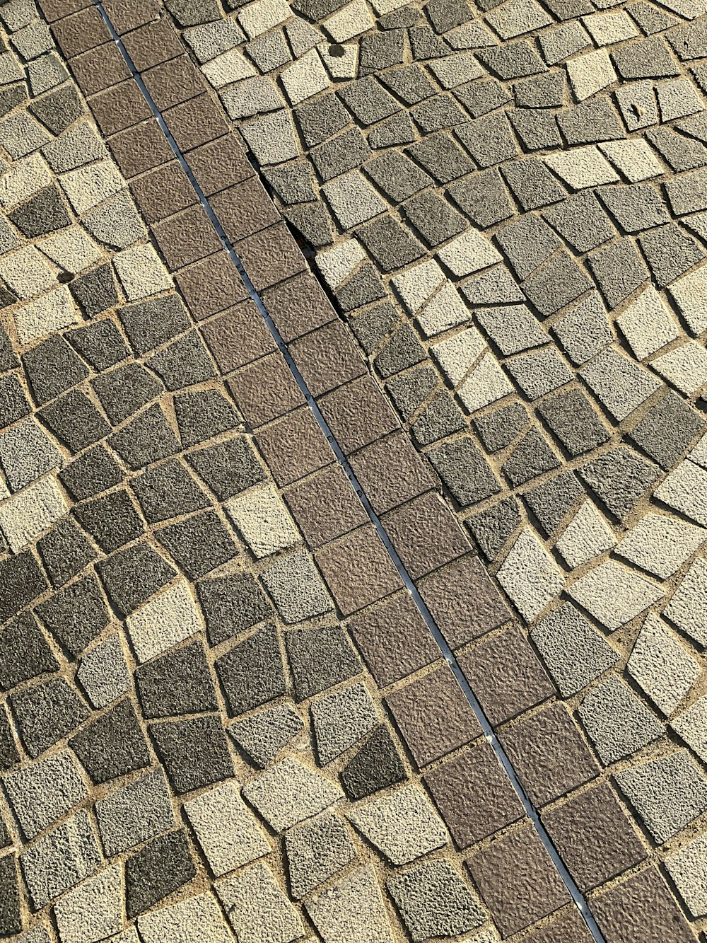 a cobblestone road with a cobblestone cobblestone cobblestone cobblestone