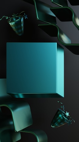A surreal composition featuring a large teal cube in the middle, accompanied by abstract shapes and objects resembling ribbon-like structures. Small party hats with stars are scattered around the scene, creating a sense of movement.