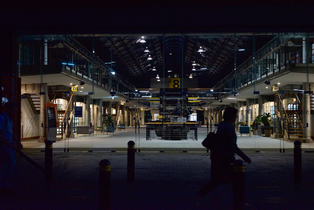 a person walking in a large building