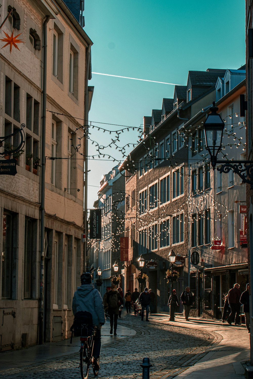 a city street with people and buildings