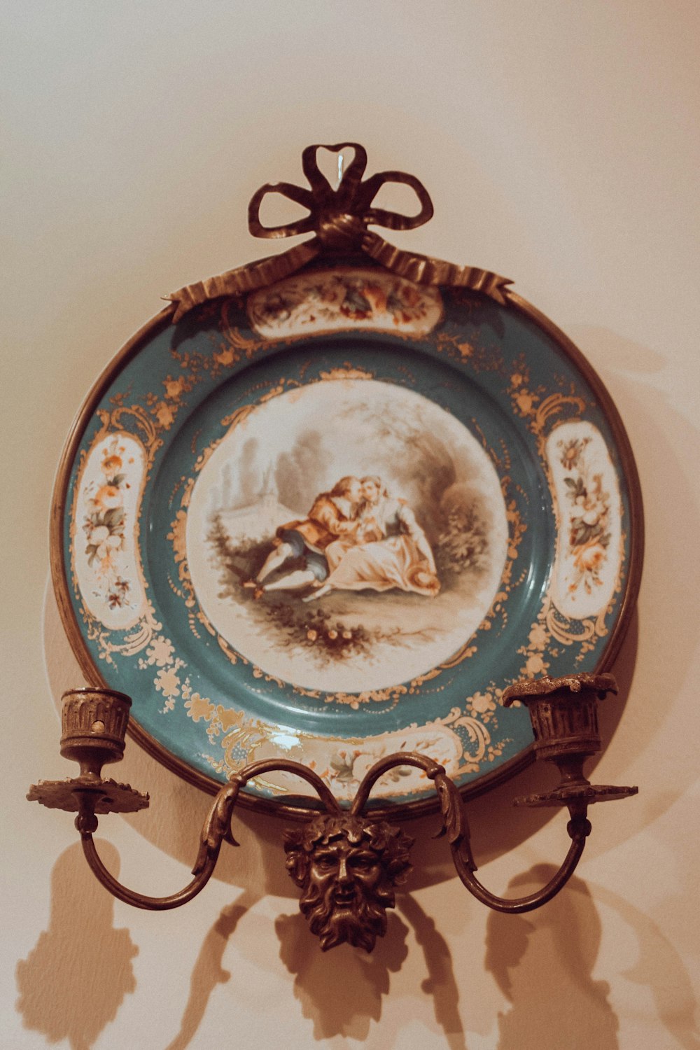 a blue and gold plate