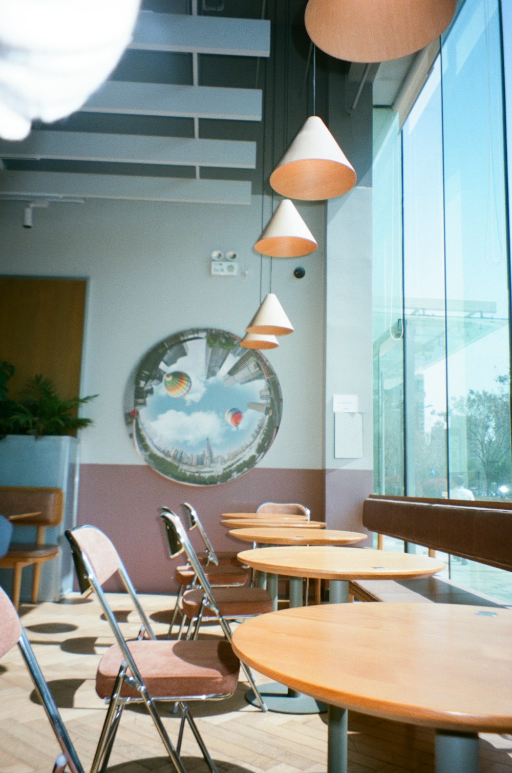 a room with tables and chairs