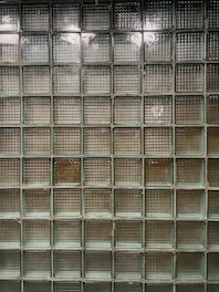 Close-up of translucent construction glass blocks stacked neatly.