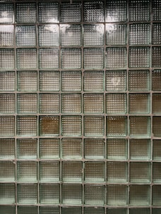 Close-up of translucent construction glass blocks stacked neatly.