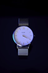 a watch with a blue face