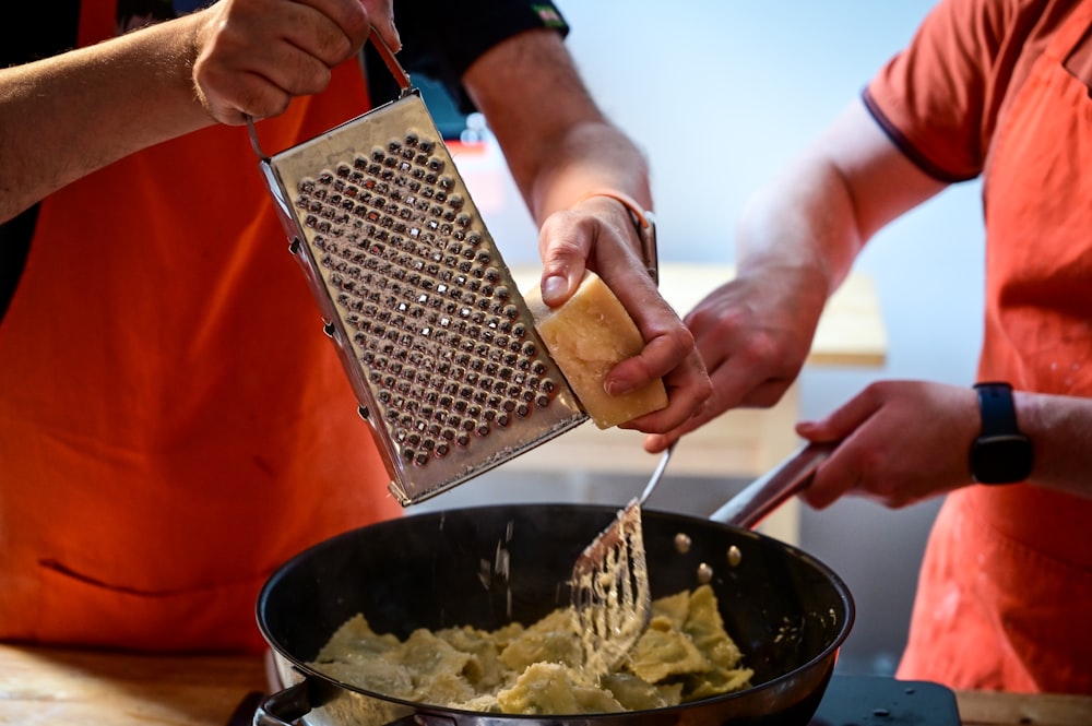 a group of people cooking