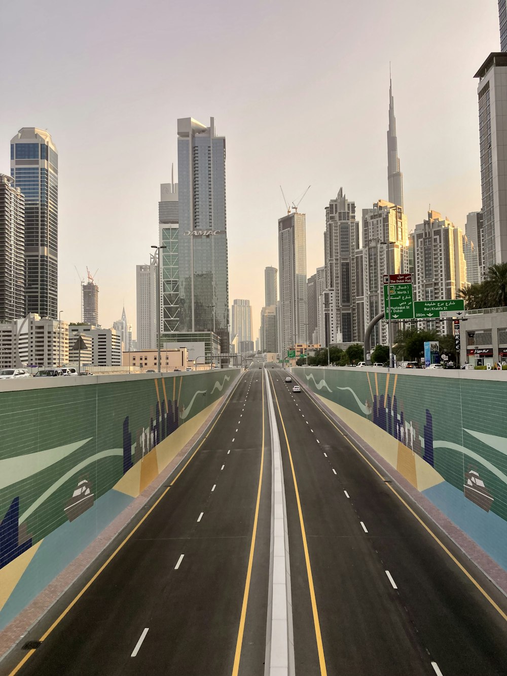 a city street with tall buildings