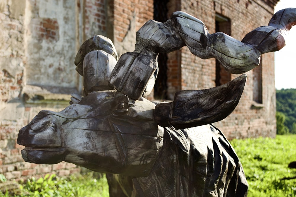 a statue of a person holding a sword