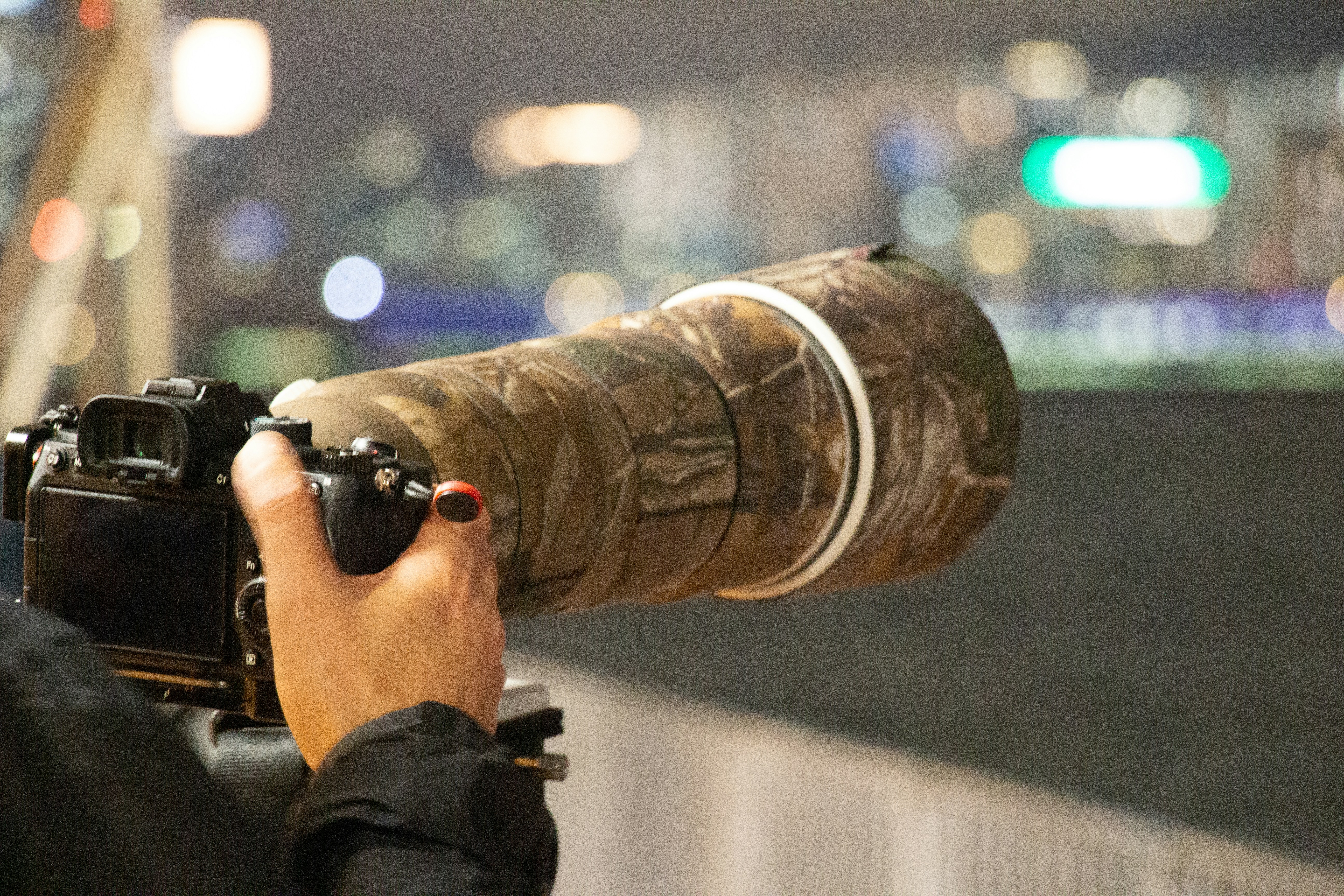a person holding a camera