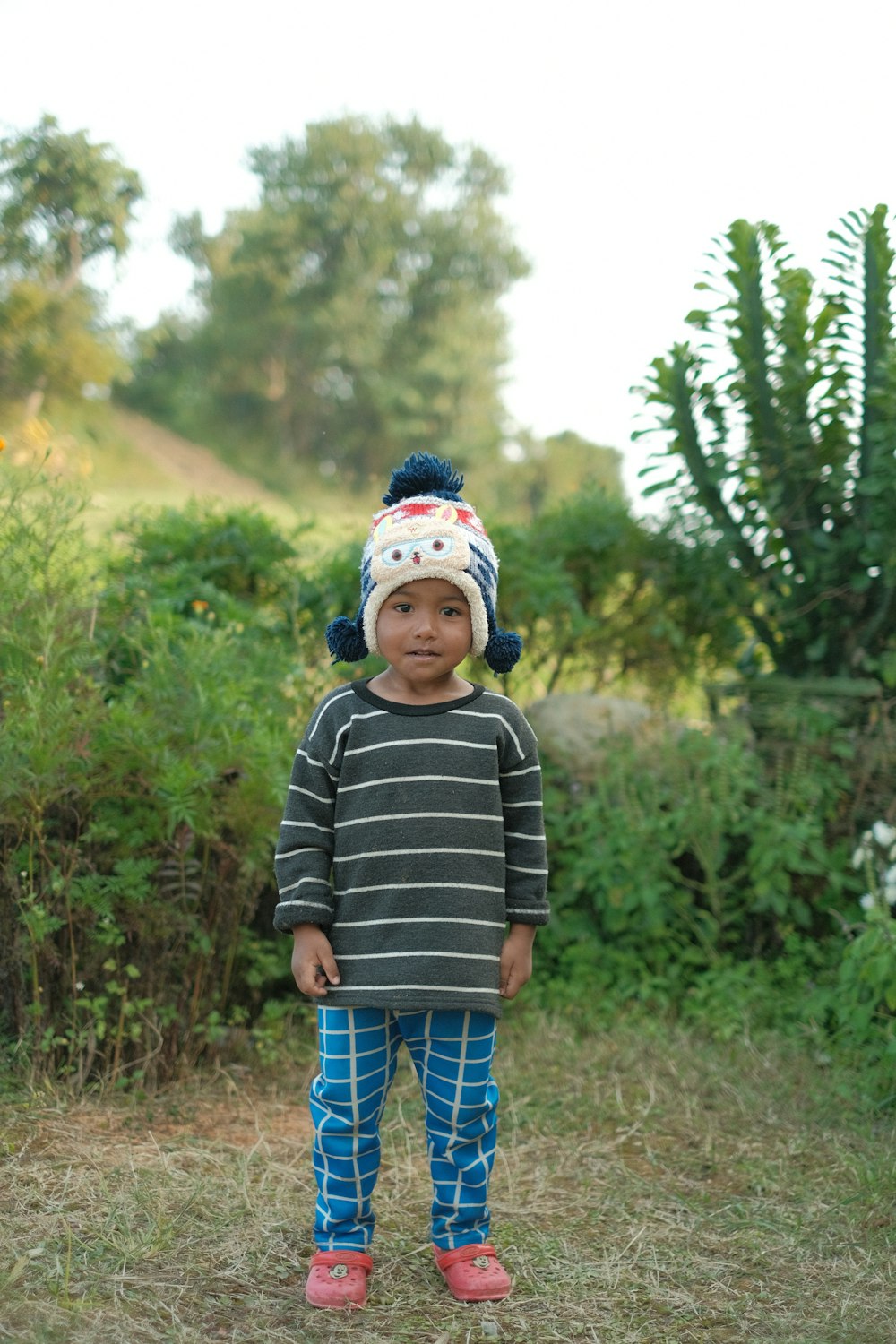 a child standing outside