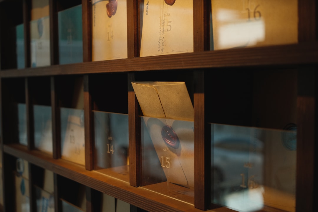 a wooden shelf with pictures on it,