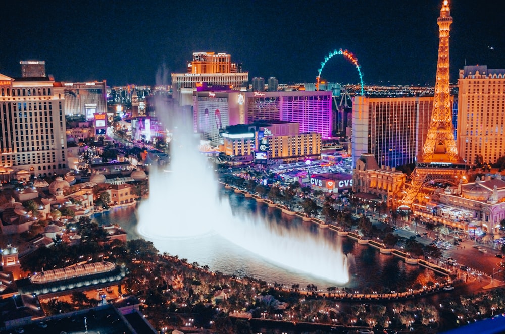 a city with a fountain in the middle of it