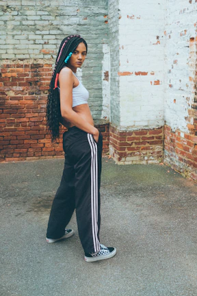 a person leaning against a wall