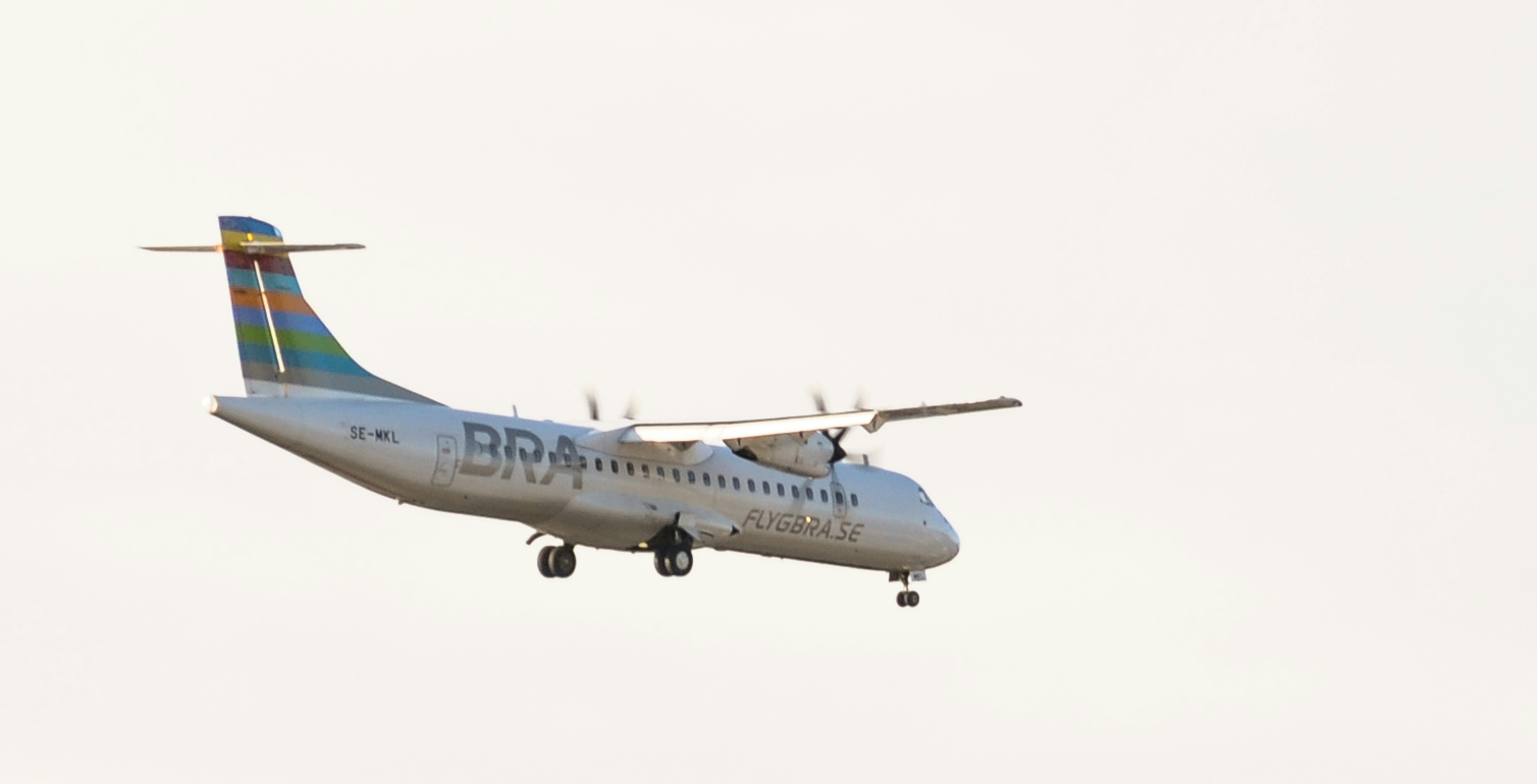 a large airplane flying in the sky