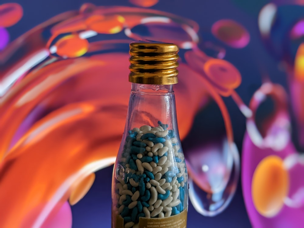 a bottle with a gold cap