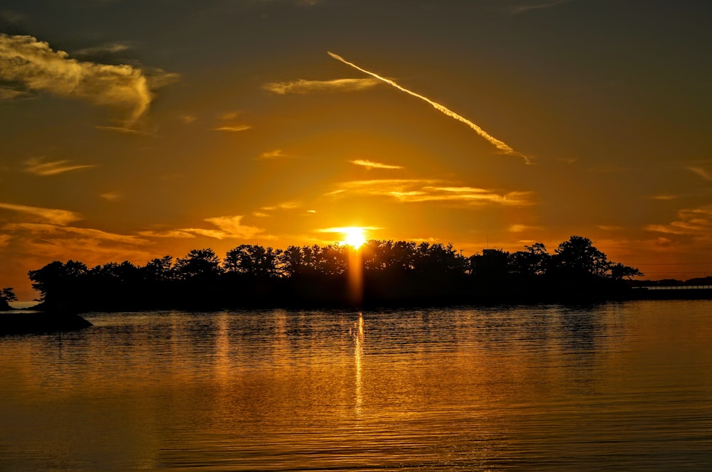 a sunset over a lake