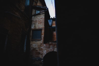 A dark alleyway known for gang activities.