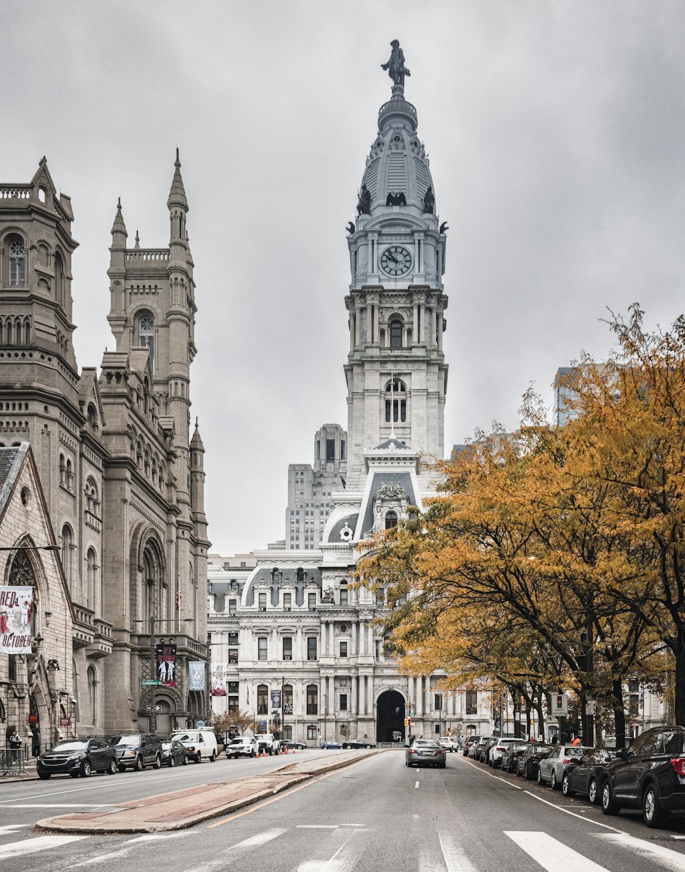 a large building towers over a city