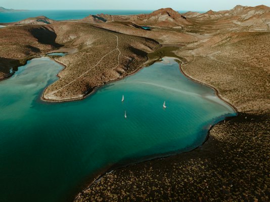 A body of water with land around it