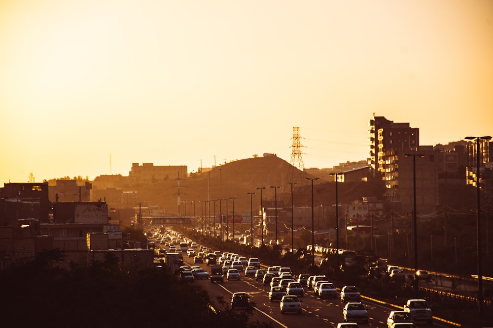 a city with a bridge and cars