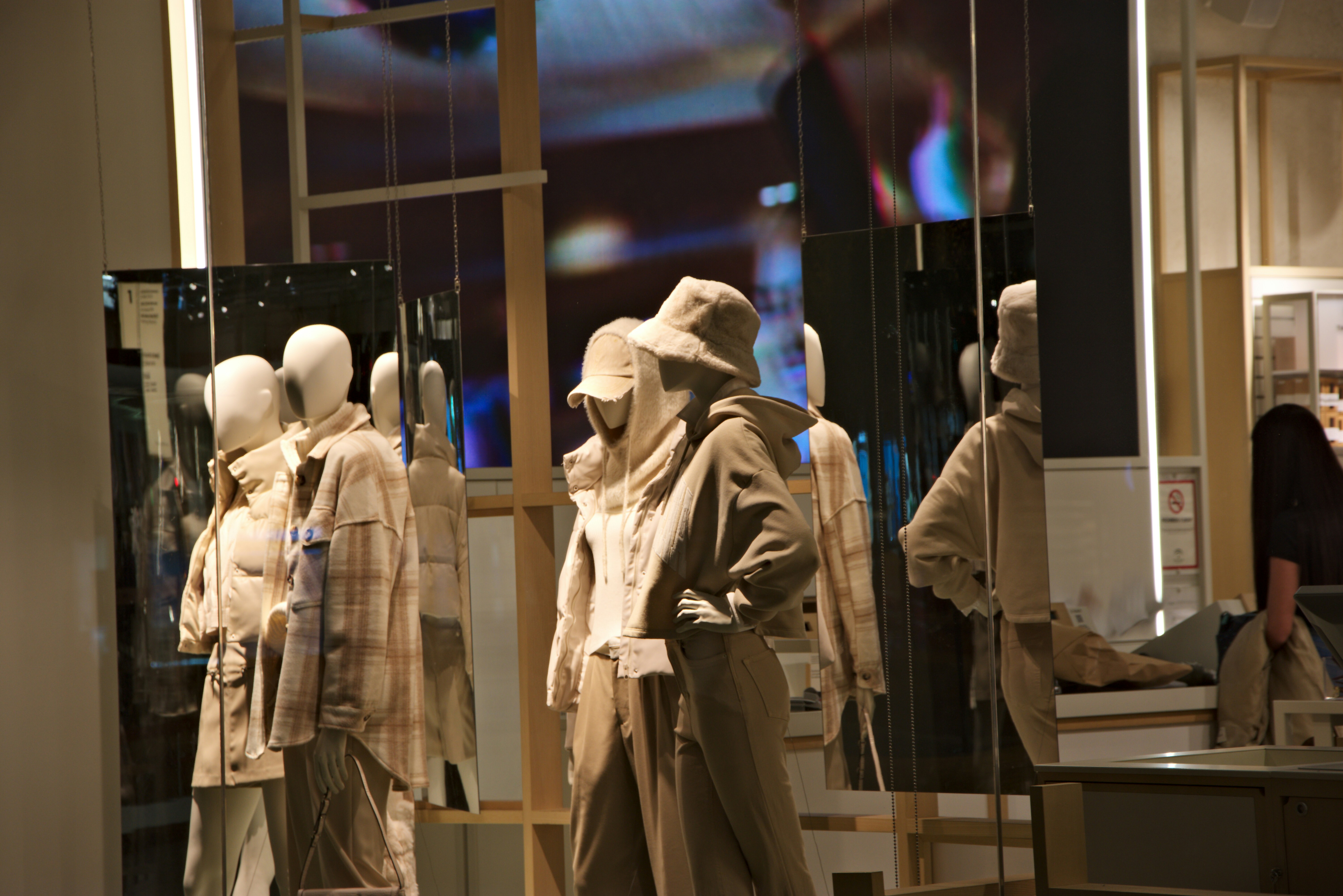 a group of mannequins in a store