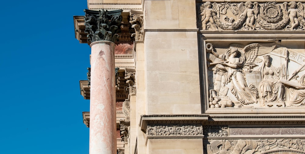 a building with a statue on the side