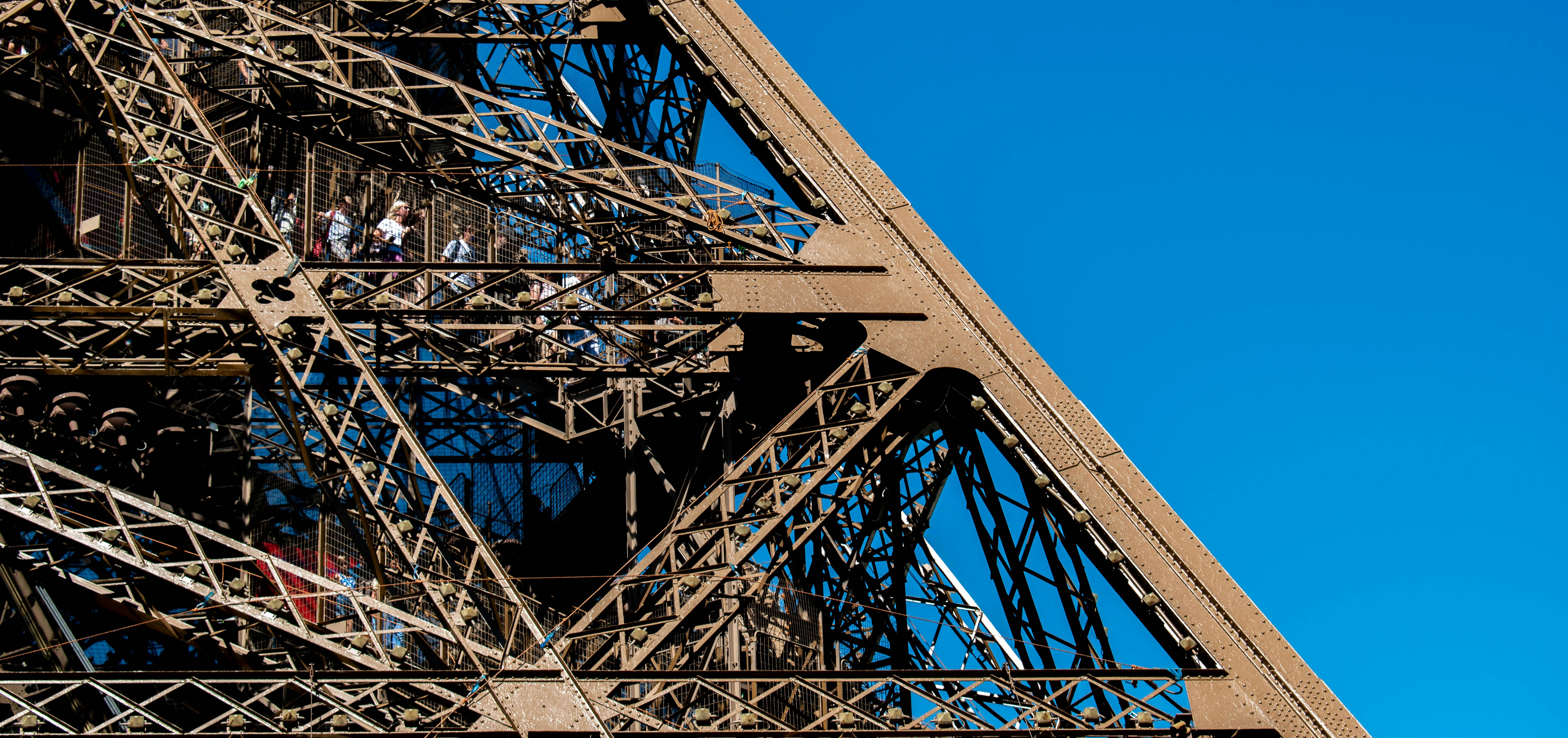 a group of people on a tall metal tower