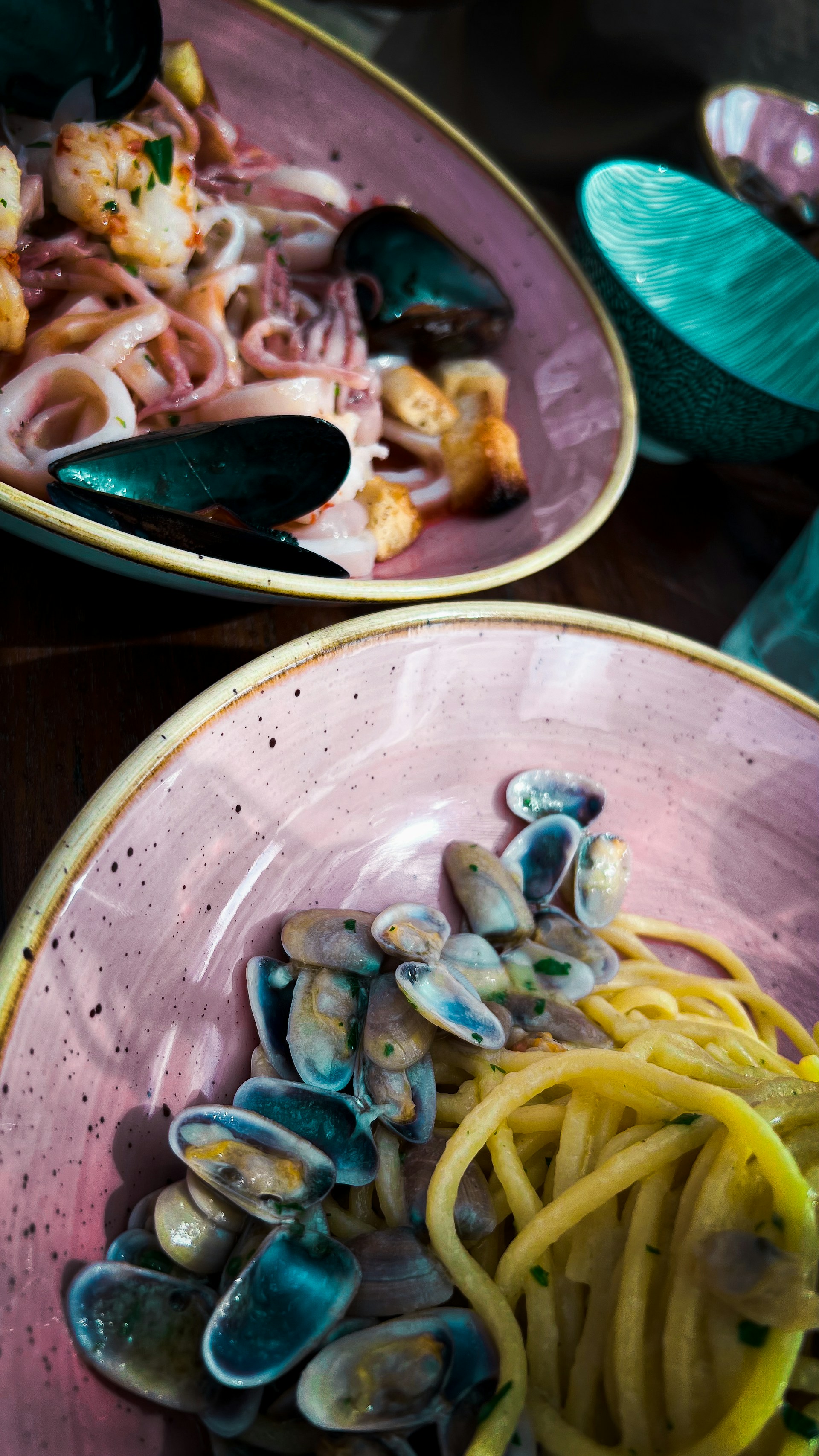 A selection of delectable Italian pasta dishes served in rustic bowls.