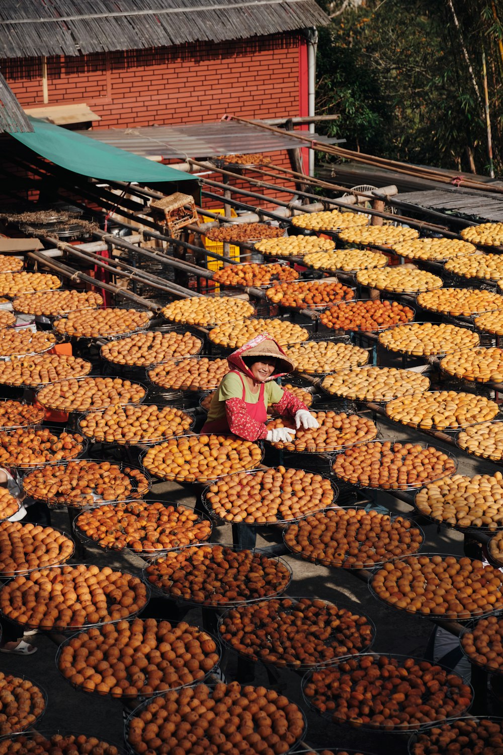 a person selling fruits