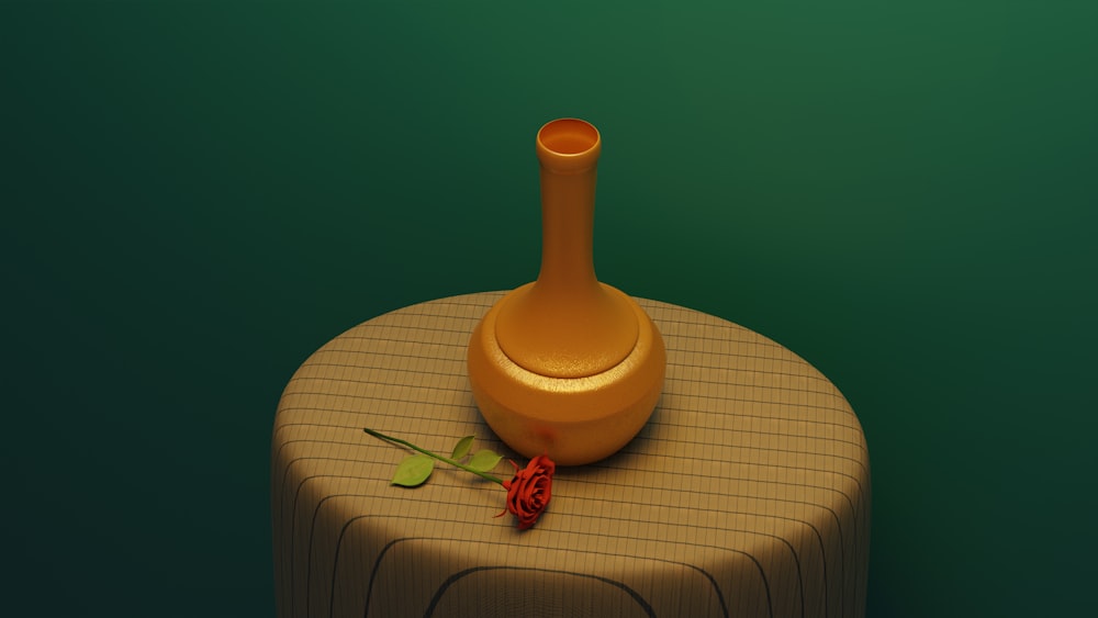 a vase with a flower in it